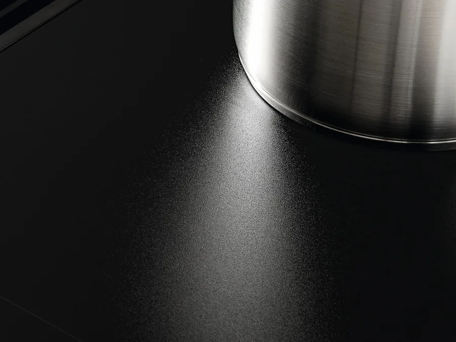 Matt black MattFinish surface of the Miele KMDA 8683 FL with a steel pot